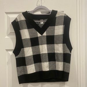 Divided plaid sweater vest